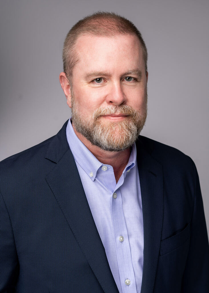 Khan Smith headshot